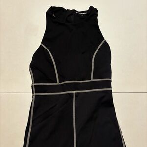 we wore what black corset bodysuit / one piece with white stitching